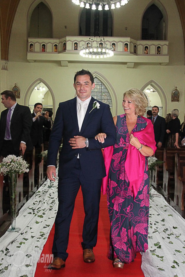 Groom enter the church with his mother