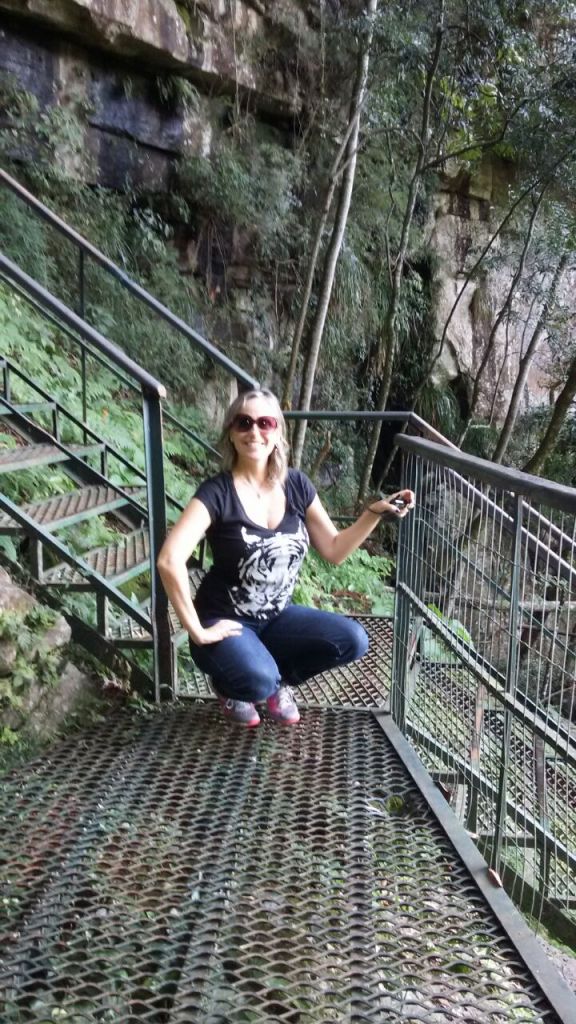My sister Angelita, braving the 927 steps down to the feet of the fall