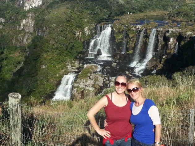 With my sister at the other side of the falls