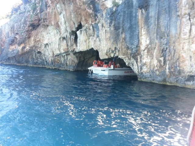The small boat fits perfectly inside the caves
